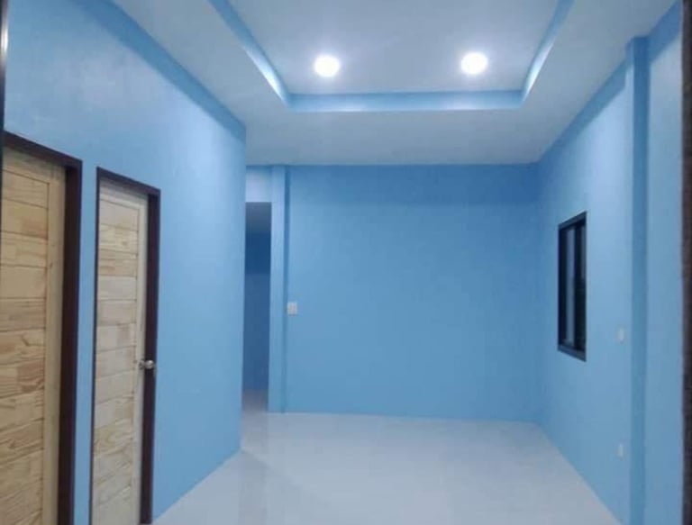 Finished hallway with painted walls and drywall ceiling with recessed lighting by Garnet Painting & Remodeling GA