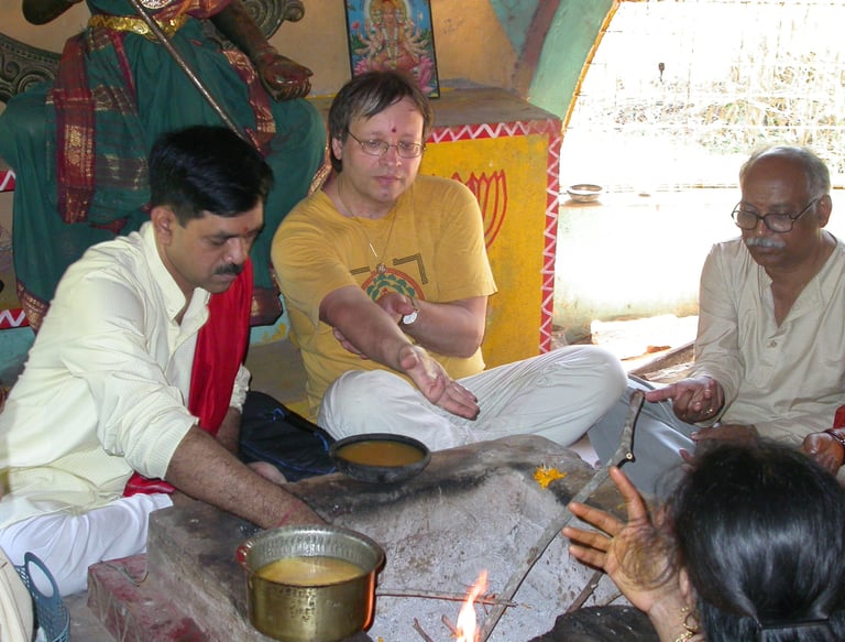 William Thomas engaged in a Homa ritual at Devipuram India