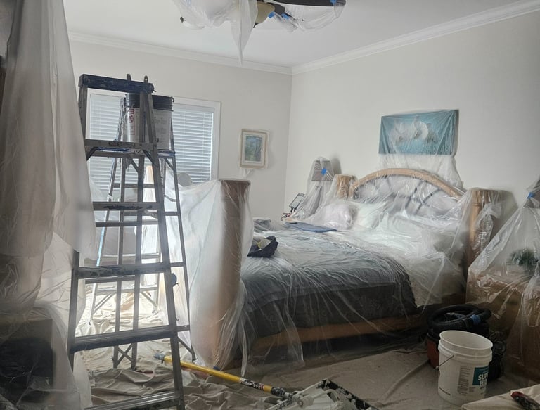 a bedroom with a ladder and a ladder