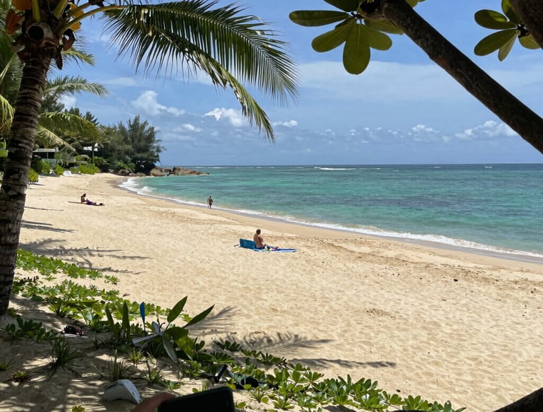 A sleek car parked by the sunny beachside of Golem, ready for a city drive.