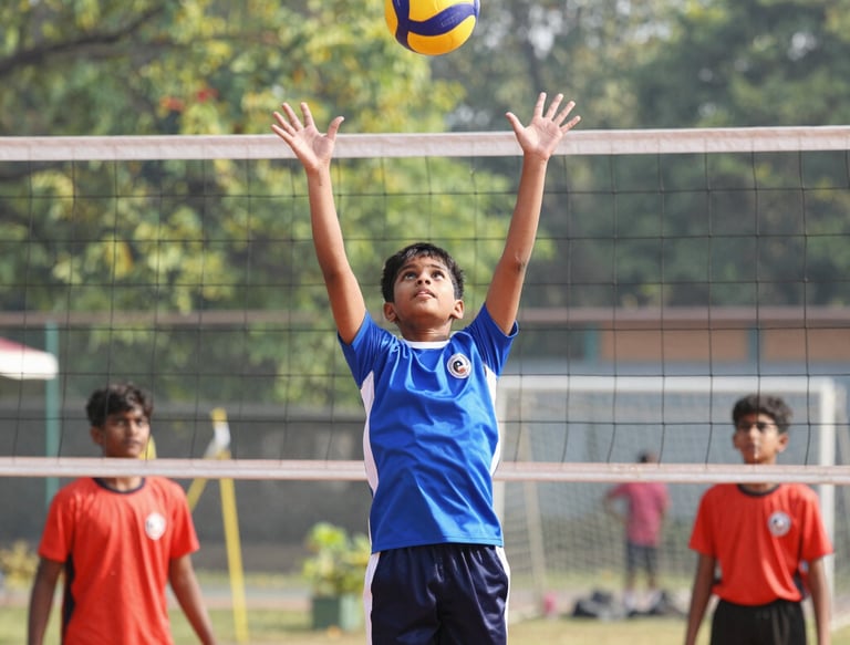 A warm, candid shot of village youth playing cricket during a local tournament under soft afternoon light.