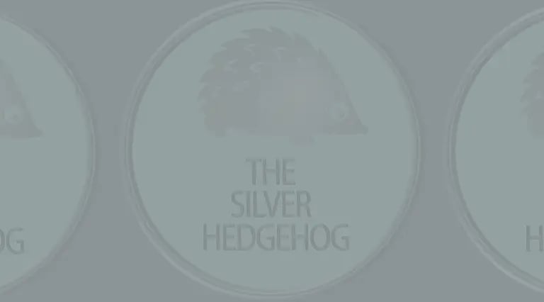 Background image of very dim silver hedgehog logos