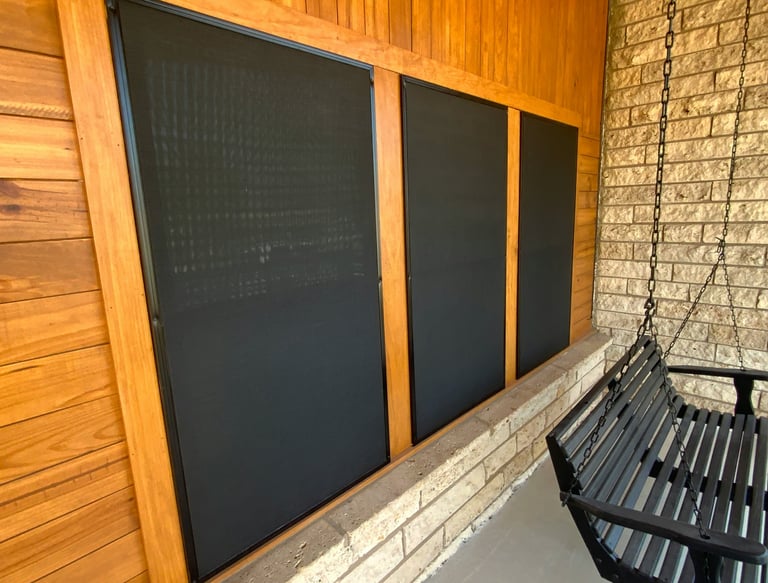 Screen Over Windows with a lawn chair