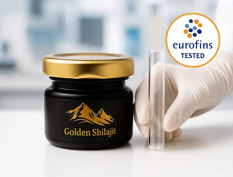 a person in gloves holding a jar of golden Shilajit