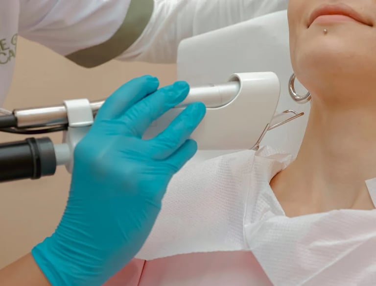 A customer is getting a neck massage at a spa.