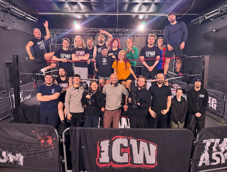 a group of students at a wrestling ring