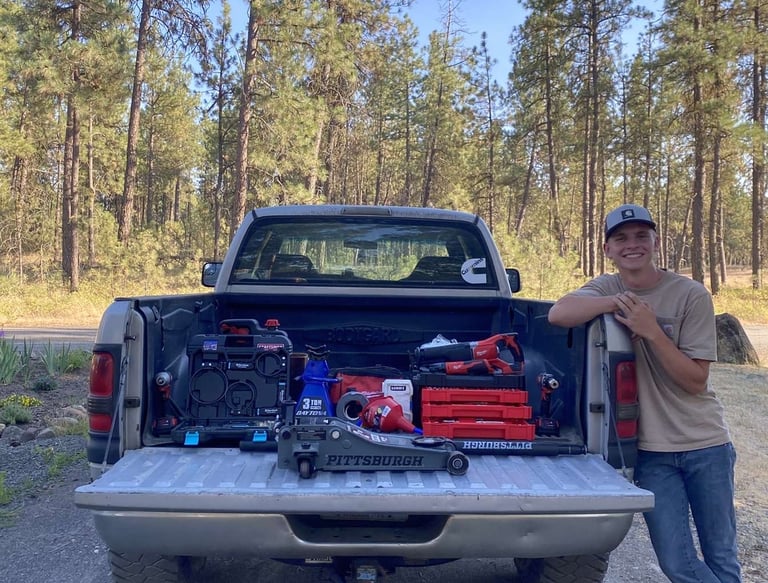 Elias in front of his tools