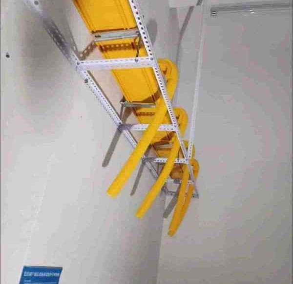 a cable ladder to reach the ceiling in a room