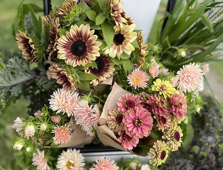 Beautiful bouquet of mixed flowers, gold and pink