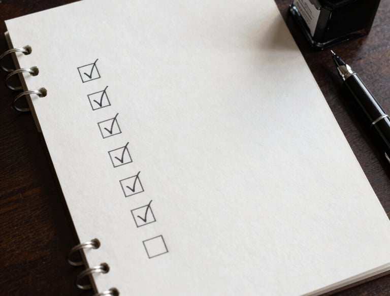 A warm handshake between a German employer and an Indian candidate in a bright office.
