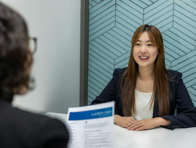 Female recruiter conducting interview at a business meeting