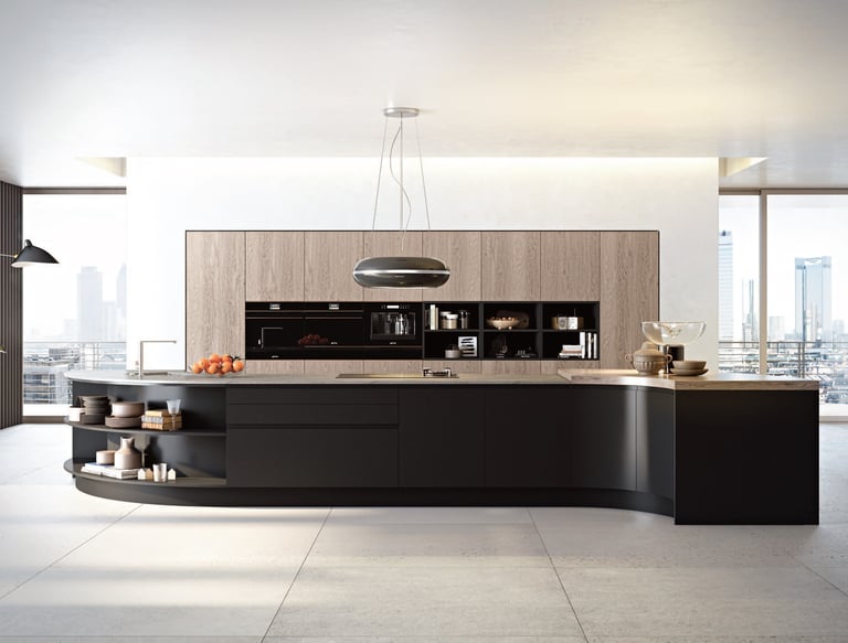a kitchen with a large island style counter top