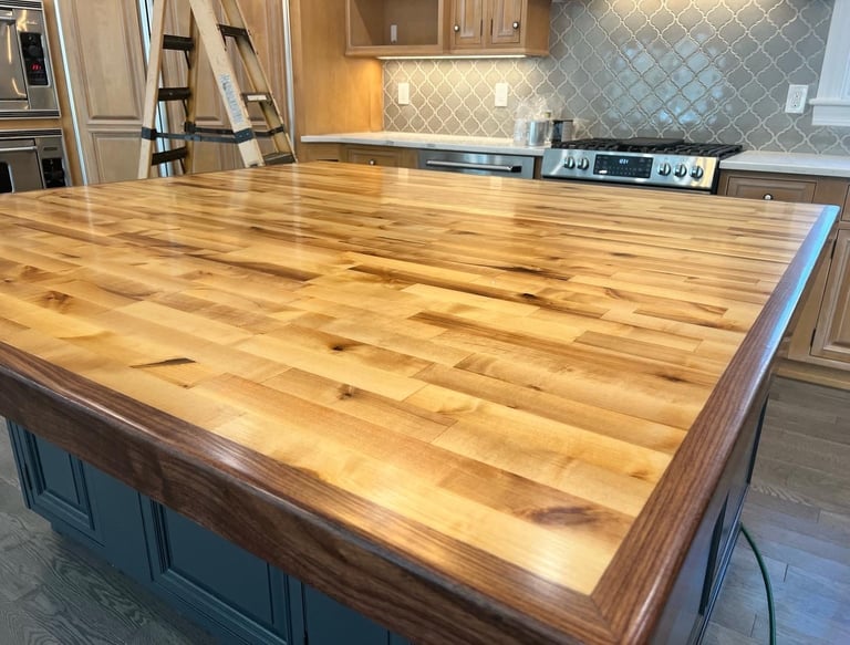 Handcrafted wood and epoxy butcher block countertop with a durable, smooth finish, blending natural
