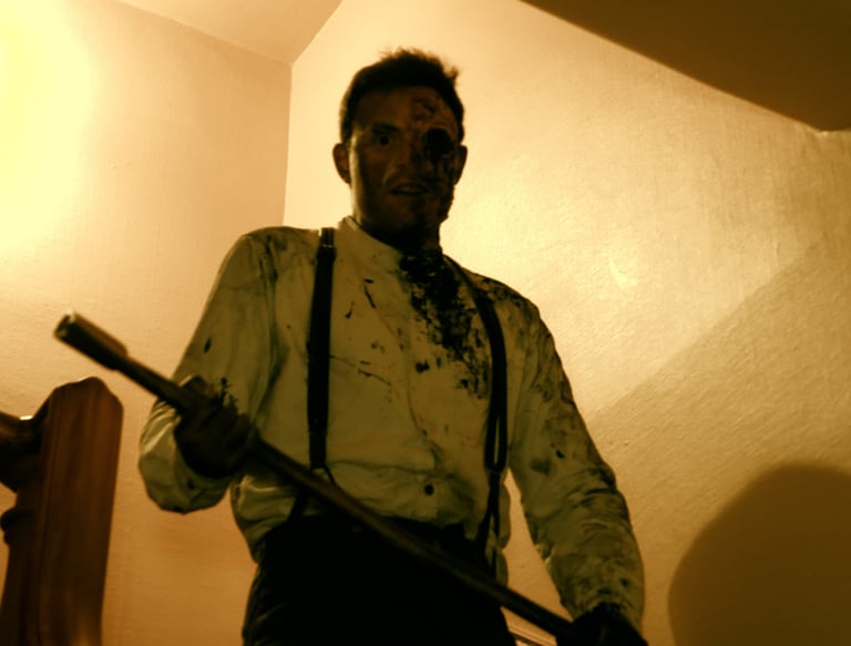 Threatening man walks down stairs, Nathan Green, 1000 Steps, 2020