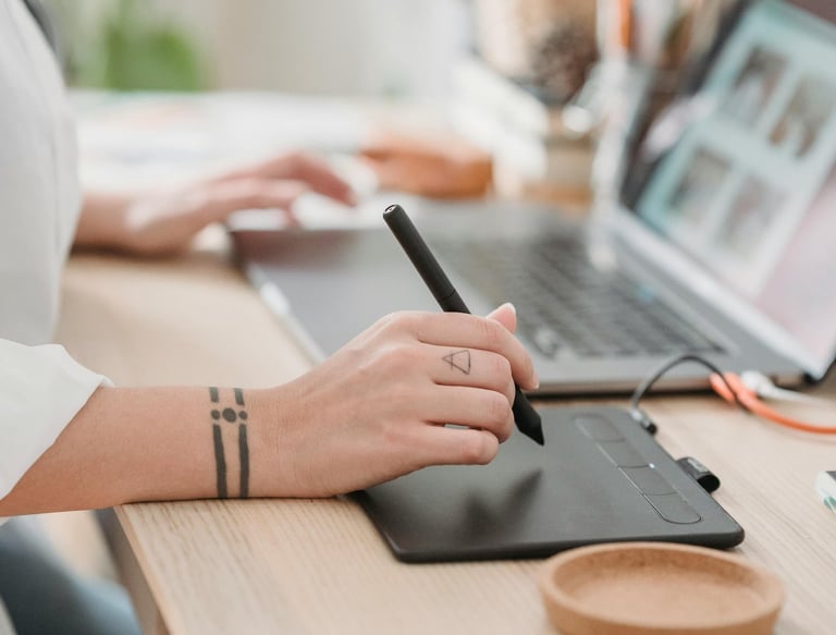 a woman sitting at a desk with a pen and a pen
