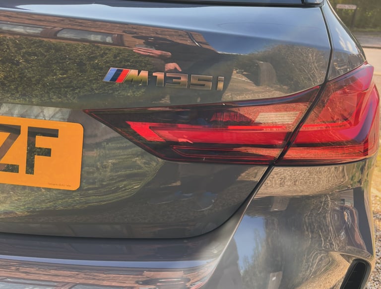 a car with a license plate on the back of it