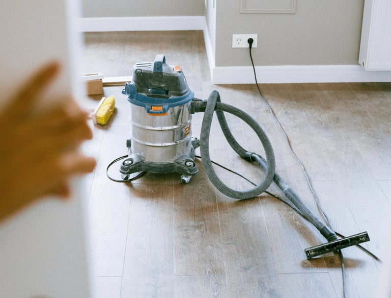 Professional post-construction cleaning service for dust and debris removal in a new home