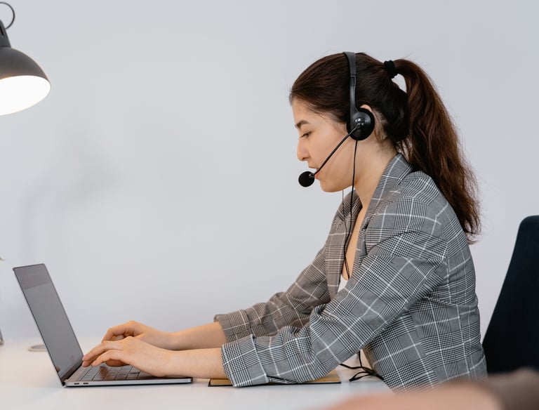 a woman in a headset with a headset and a microphone