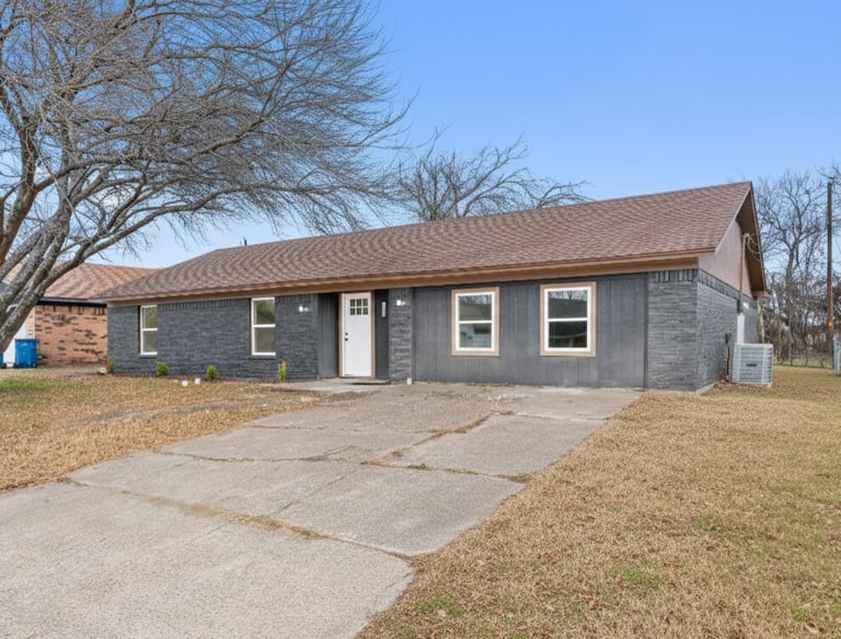 a house with a driveway and a driveway with a driveway