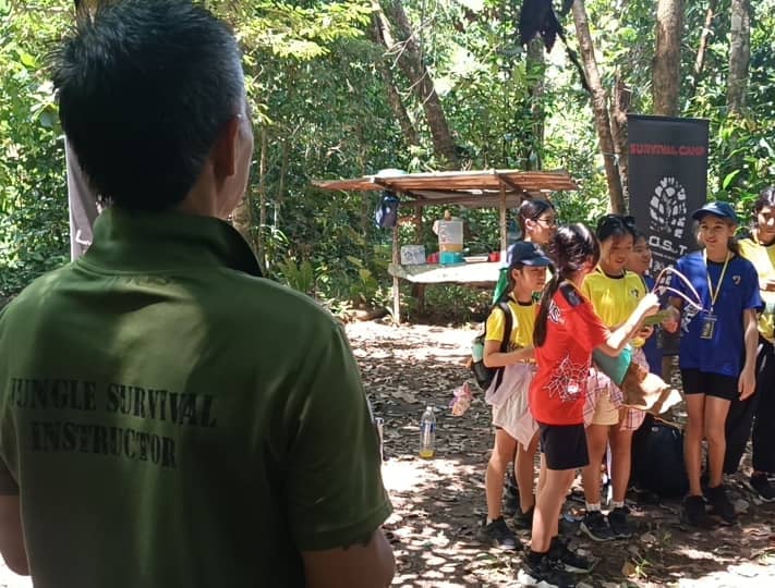 a man standing in front of a group of people