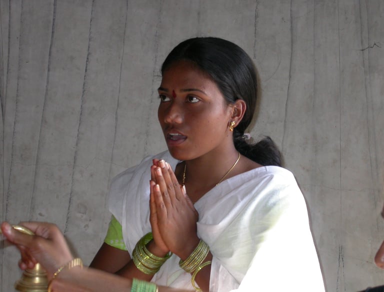 Indian Girl praying to the Goddess