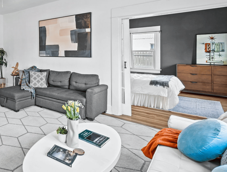 a living room with a couch and a television