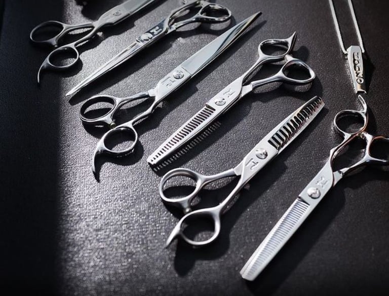 An array of tools being placed on a counter after being sharpened professionally