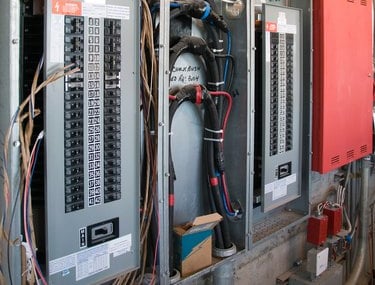 An electrical panel being expertly serviced