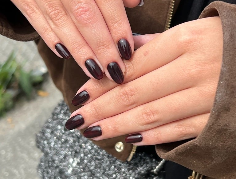 a woman's hands with a manicured manicured manicured manicured mani
