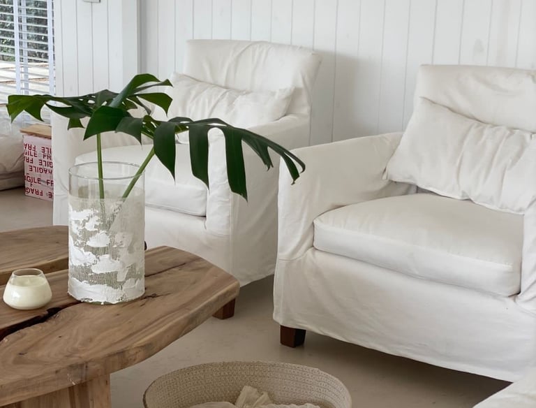 a living room with a couch and a table