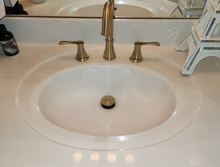 a sink with a sink and a mirror