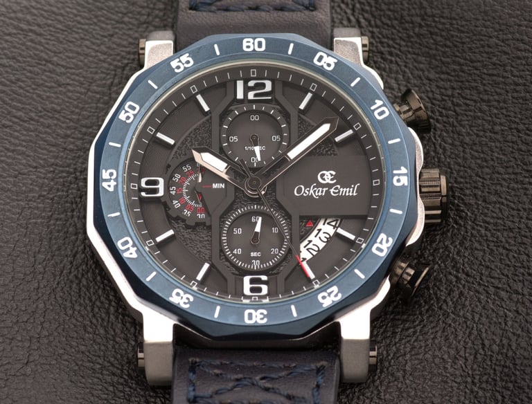 Watch photography image of the face of a watch in close up on a leather background.