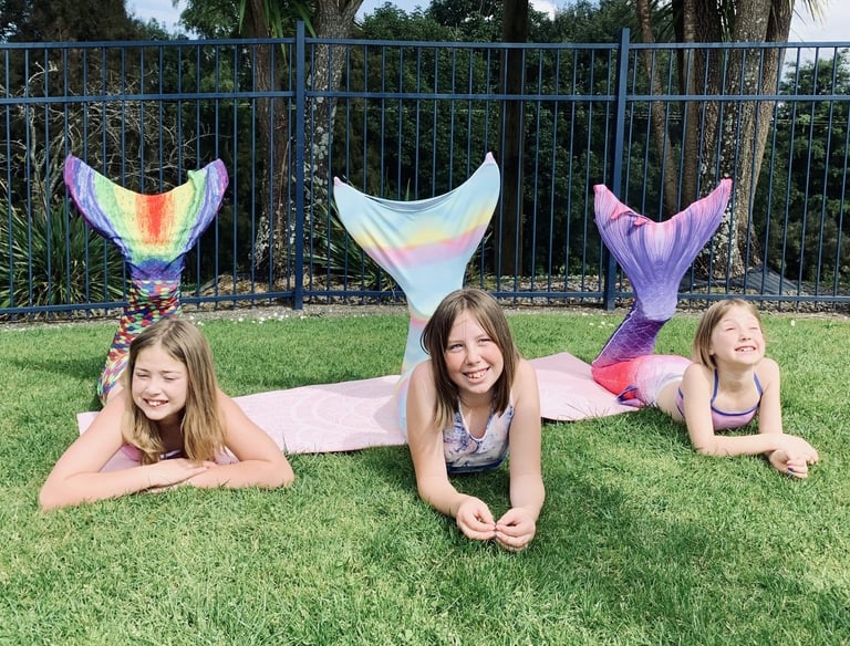 three Mermaids at a Merventure Mermaid class