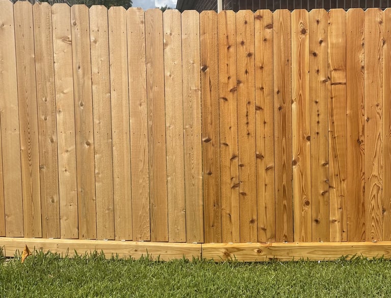 Side by side before and after oil based clear sealant application on a new wooden fence.