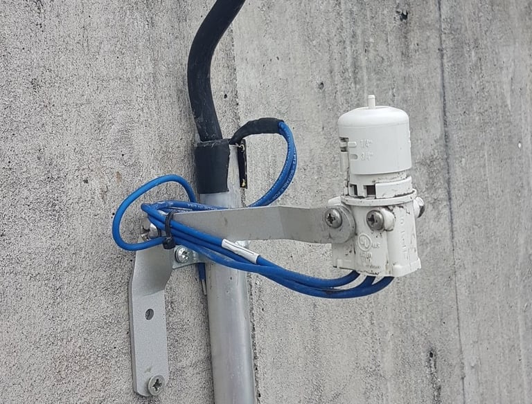  a wall-mounted rain gauge