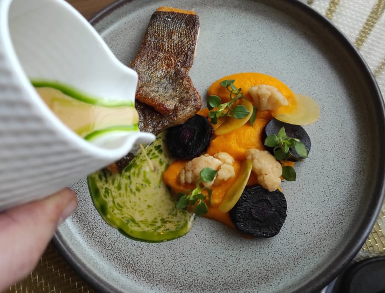 grilled fish with carrot puree and split butter sauce