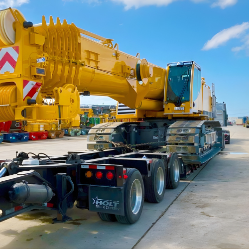 heavy equipment transport between construction job sites 