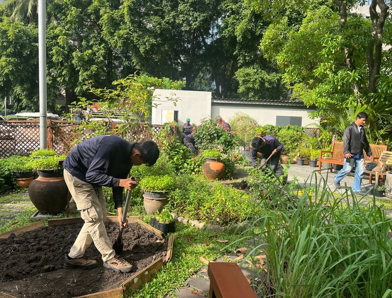Plowing team in a big garden