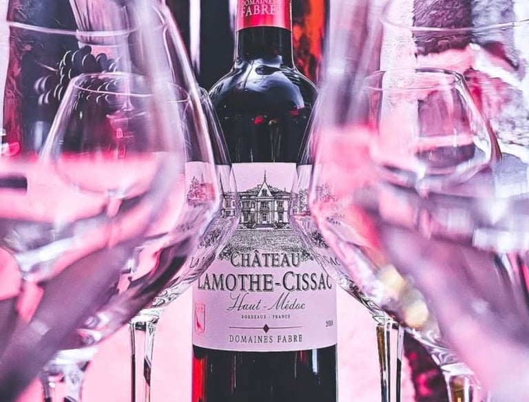 a bottle of wine with a bottle of wine in front of a wine glass