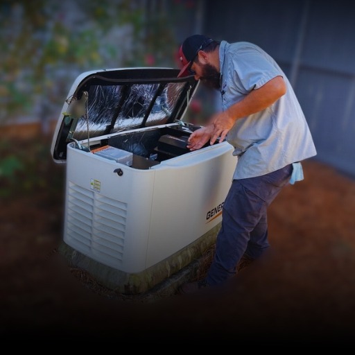 A Williams electric service & generator service techs checking the oil in a generac home generator