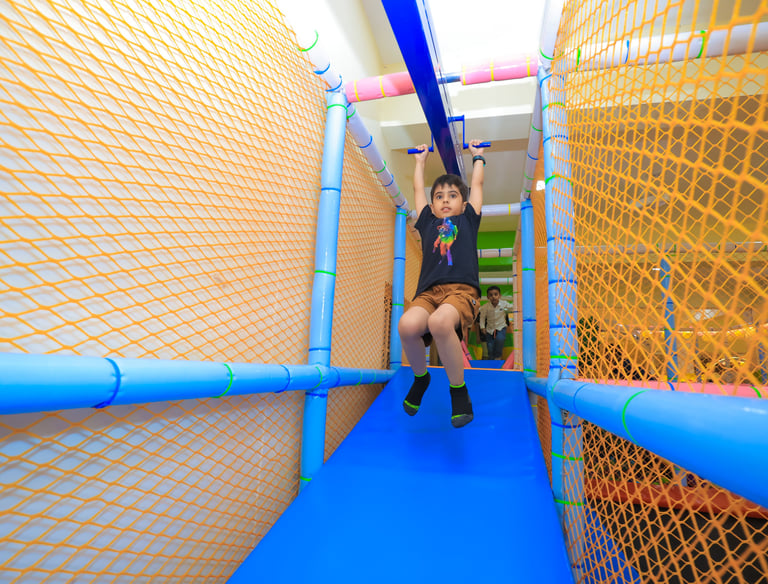 Boy having fun in play zone.