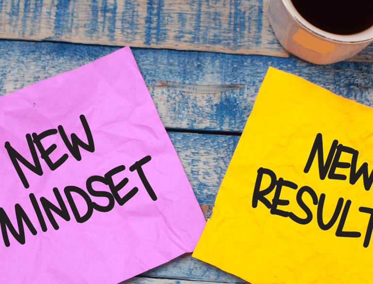 a cup of coffee and a cup of coffee on a table