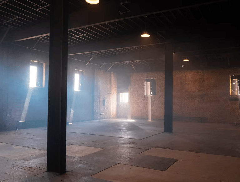 Warehouse loft rental Los Angeles — Grayfox Studios industrial space with exposed brick, steel beams