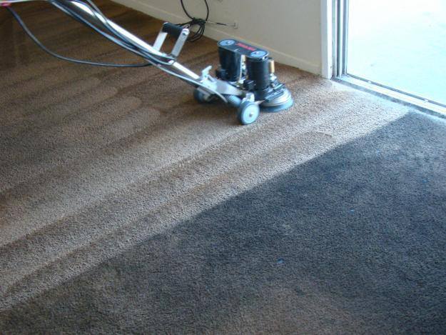 Restoration carpet cleaning by Grossbusters using the Rotovac Powerwand