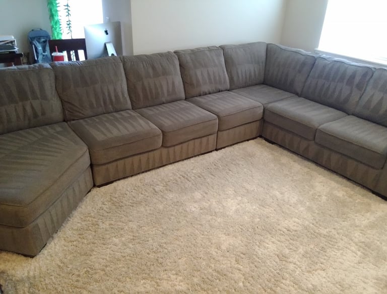 Freshly cleaned sectional sofa upholstery by Grossbusters