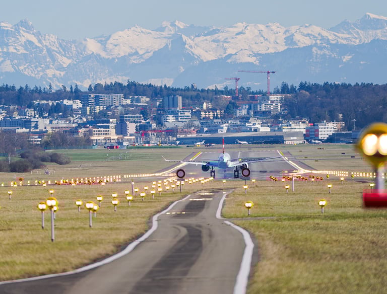 a plane taking off from the runway at the airport