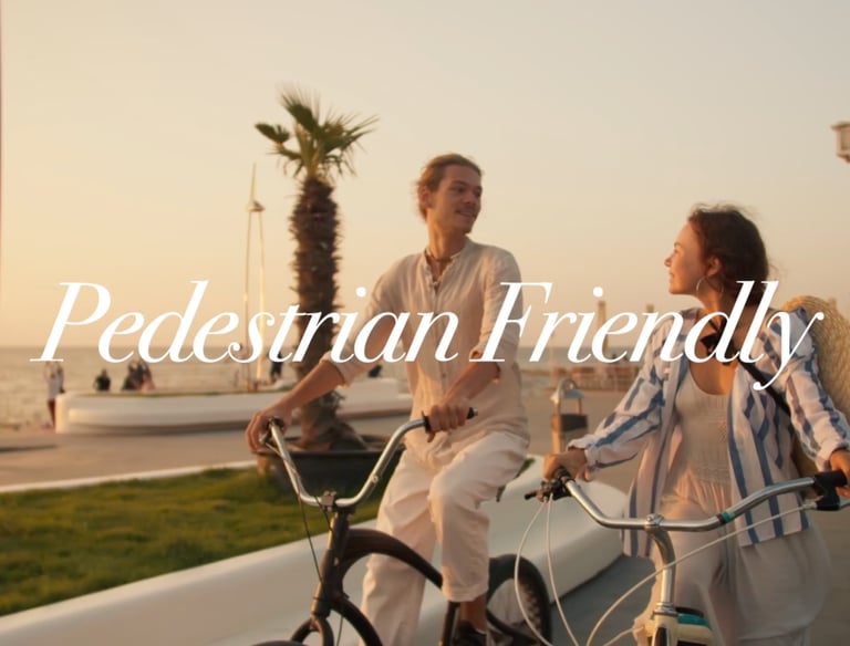 a man and woman riding bicycles on a sunny day at cala sahl hasheesh