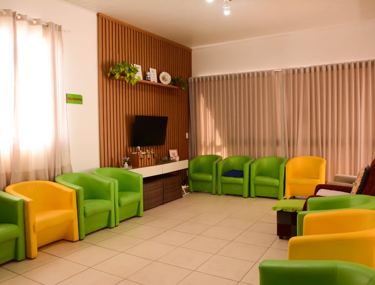 Sala de Estar com Poltronas e TV