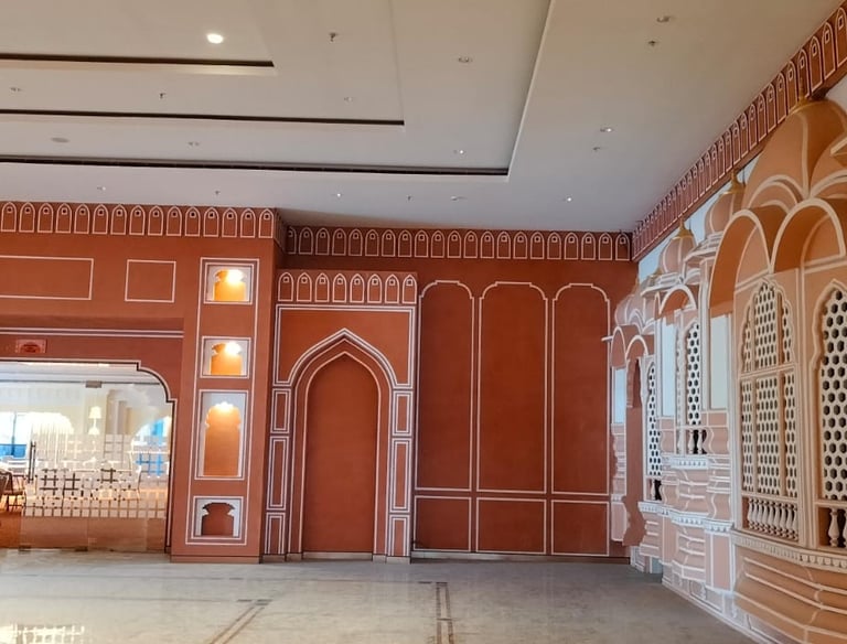 a large room with a red wall art