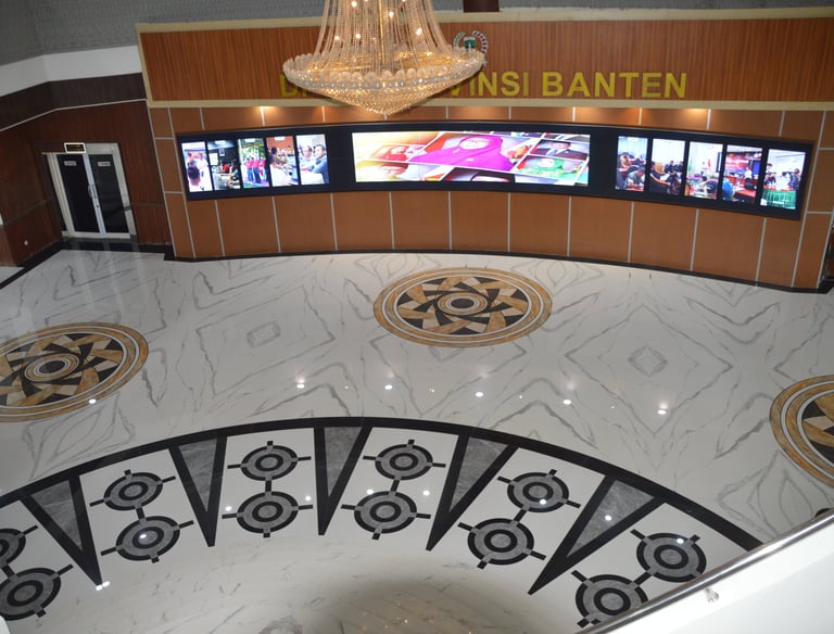 a large screen tv set up in a lobby